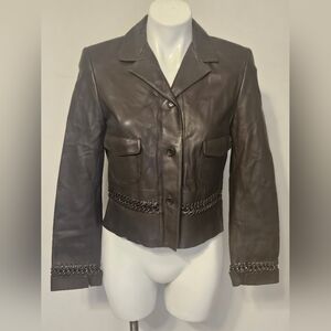 Carlisle brown leather jacket with distinctive whipstitch and chain details